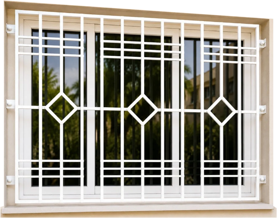 White powder-coated iron grill with a diamond pattern fitted over a window