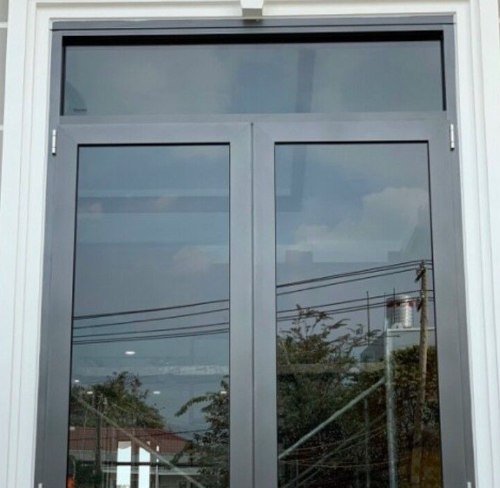 Dark grey double casement window with a fixed top light